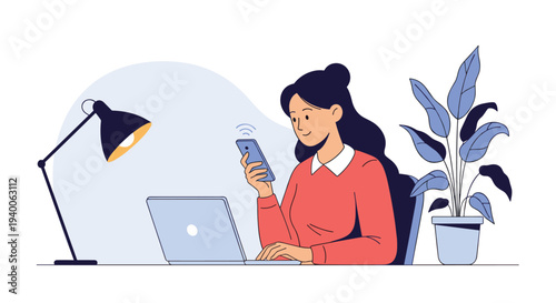 Young woman sitting at her desk uses a smartphone while working on a laptop computer in a well-lit office environment.