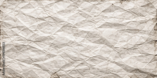 A blank sheet of crumpled white paper texture with a creased and wrinkled surface creates an old vintage material pattern on this empty crushed page