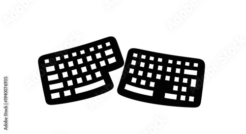 Computer keyboard input devices side by side.