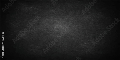 Abstract a textured, dark chalkboard with subtle gradients and a classic vignette effect, offers an inviting canvas for content creation and visual communication. 