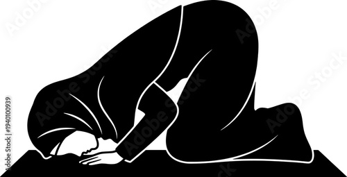 Woman in prostrate position on prayer mat