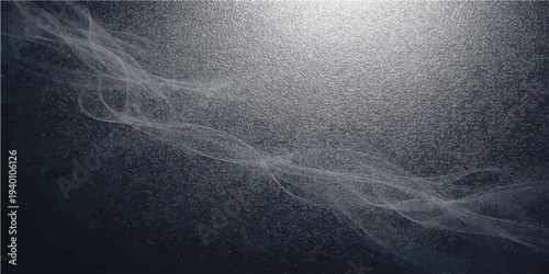 Abstract smoky wisps of light dance across a textured surface, bathed in shades of grey and charcoal. the interplay of light and shadow evoking a sense of ethereal beauty.