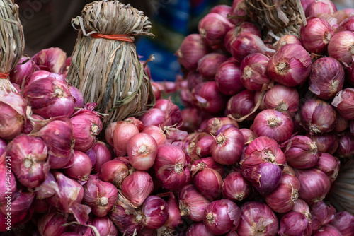 Wallpaper Mural Fresh Red Shallot Bunches for Sale at the market - Essential Ingredient for Cooking Torontodigital.ca