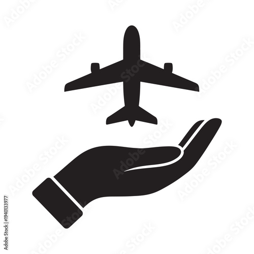 A black silhouette of an airplane held safely in an open human hand