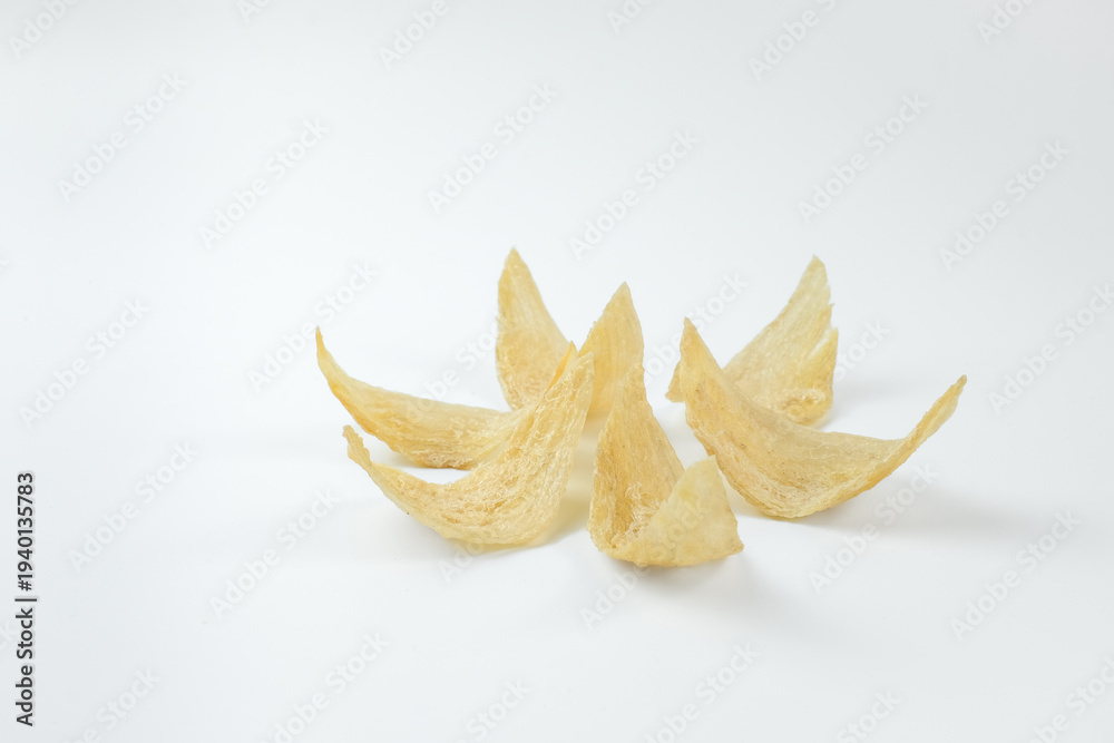 Fototapeta premium Fan arrangement of fresh edible bird's nest pieces on white background