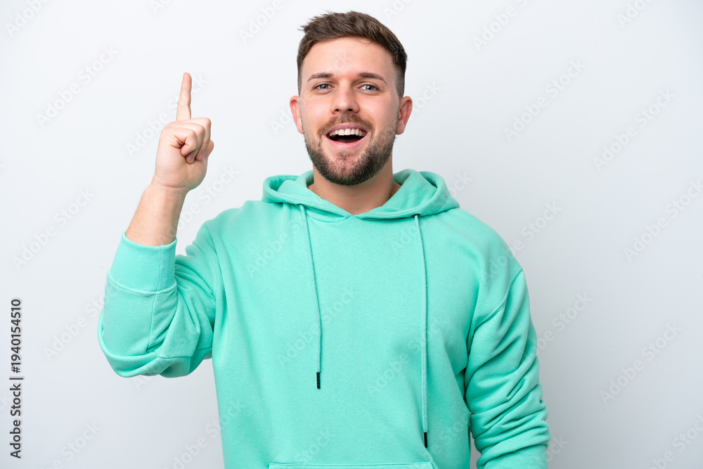 Fototapeta premium Young caucasian man isolated on white background intending to realizes the solution while lifting a finger up