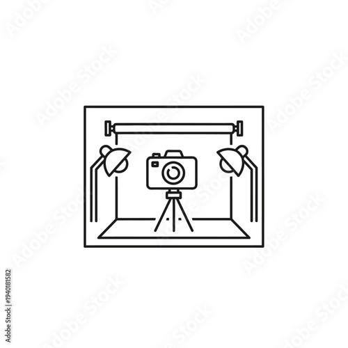 Professional Photography Studio Setup with Camera and Lighting Equipment