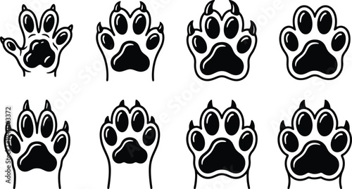 Set of eight vector illustrations featuring various animal paw prints in different styles and orientations