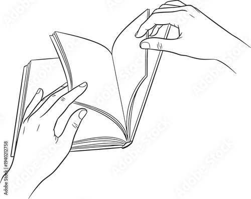 Hands holding and turning pages of a book reading