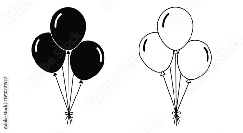 Contrast of black and white balloons a striking graphic silhouette