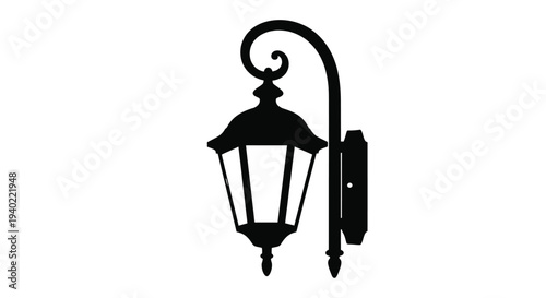 Elegant wall mounted lantern design presented as a dark silhouette