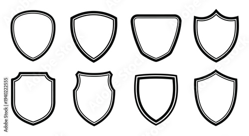 Collection of eight black shield shapes a stark graphic silhouette