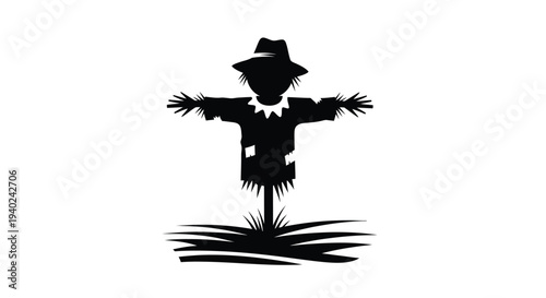 Black silhouette of a scarecrow standing in a field a rural scene silhouette