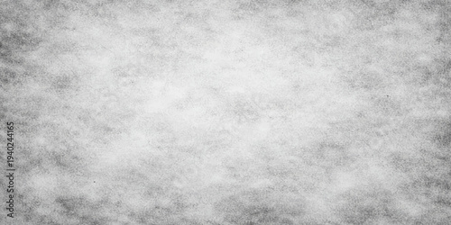 Dark grey grunge paper texture with an aged rough surface and vintage dirty pattern for a dark blank wallpaper backdrop