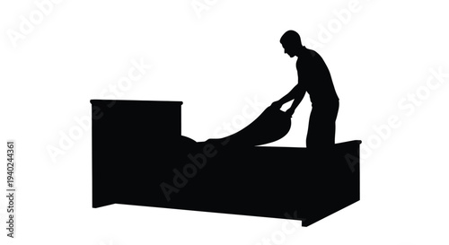 Man making a bed with black shape against a white background silhouette