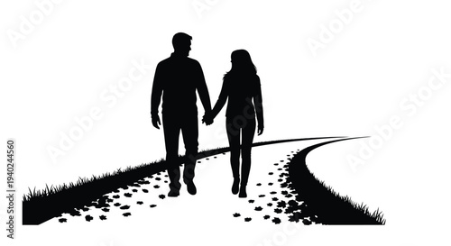 Couple walking hand in hand along a path a striking silhouette