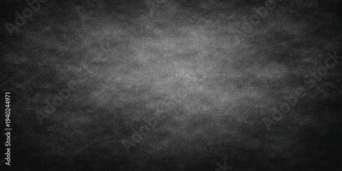 Empty dark black grunge concrete wall texture with a vintage weathered stone pattern on an old blank grey surface backdrop
