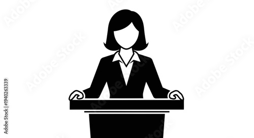 A woman stands confidently behind a podium, addressing an audience with poise and authority.