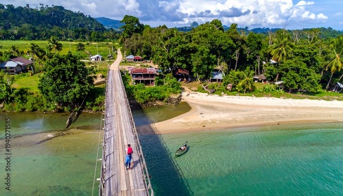 Scenic bridge over river in tropical landscape, Sabah, Malaysia.