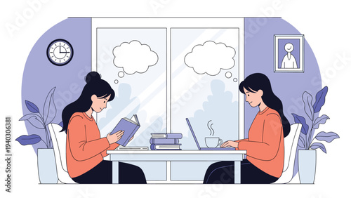 Two young women sitting together at a table in a bright room, one reading a book and the other working on a laptop computer.