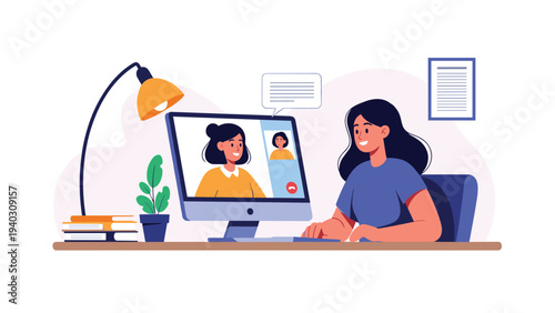 Professional woman working from home sits at her desk and participates in a video conference call on a desktop computer in a cozy office.