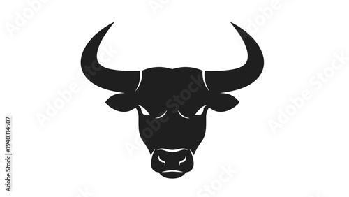 Powerful black silhouette of a bull head with large curved horns and a strong gaze isolated on a white background.