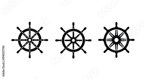 Three black ship wheels displayed in a graphic design silhouette