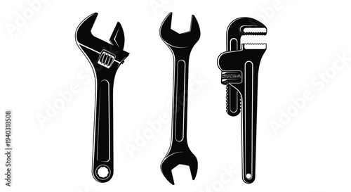 Three adjustable wrenches in a striking black silhouette
