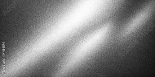 Brushed silver metal texture background with shiny stainless steel surface and industrial metallic pattern