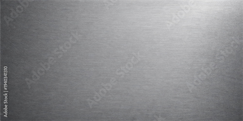 Brushed silver metal texture background with shiny stainless steel plate surface and industrial metallic pattern