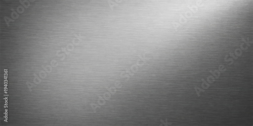 Brushed silver metal texture background with shiny stainless steel surface and industrial metallic pattern
