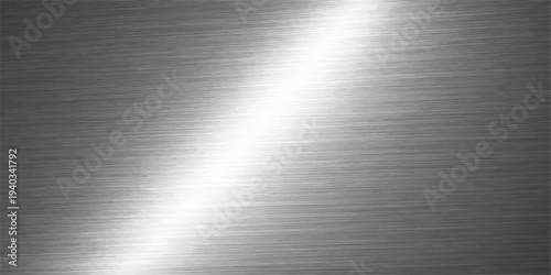 Brushed silver metal texture background with shiny stainless steel plate surface and industrial metallic pattern