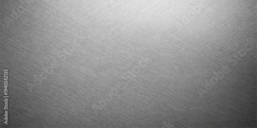 Brushed metal texture background with gray steel surface and metallic pattern design