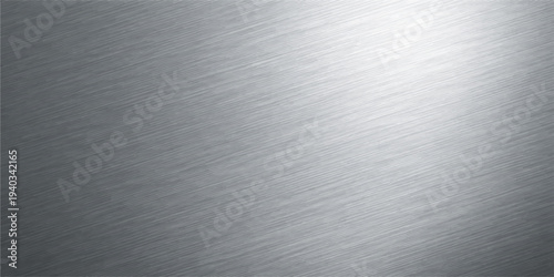 Brushed silver metal texture background with shiny steel plate surface and industrial metallic pattern design