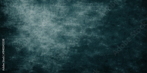 Abstract dark blue grunge background with smoky storm clouds and textured vintage wall pattern design