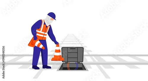 Construction worker inspecting underground utility box with traffic cones and safety gear