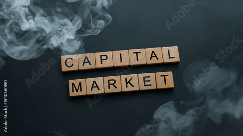 Capital Market written in wooden tiles with smoke effect in a moody ambiance