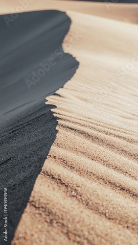 Aerial Vertical Landscape Of Winding Desert Sand Dunes With Soft Wind