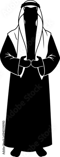 Arab man in traditional attire praying