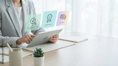 タブレットで品質管理とレビュー指標を確認する日本人ビジネスパーソン