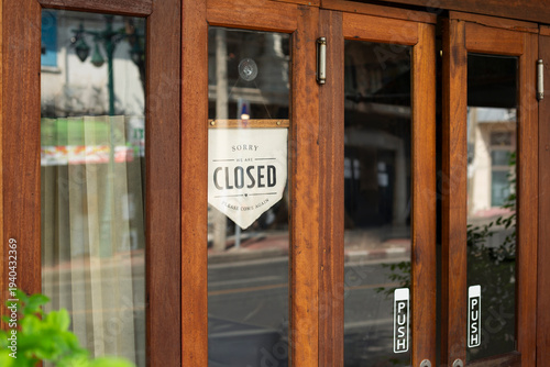 open sign hanging outside a restaurant, store, office or other