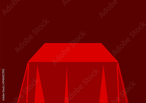 Maroon Themed Background with a square cloth covered table in bright red in the middle to place the product
