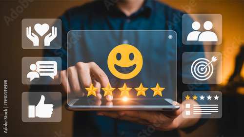 Customer satisfaction and feedback concept represented by a person using a tablet with icons and star ratings