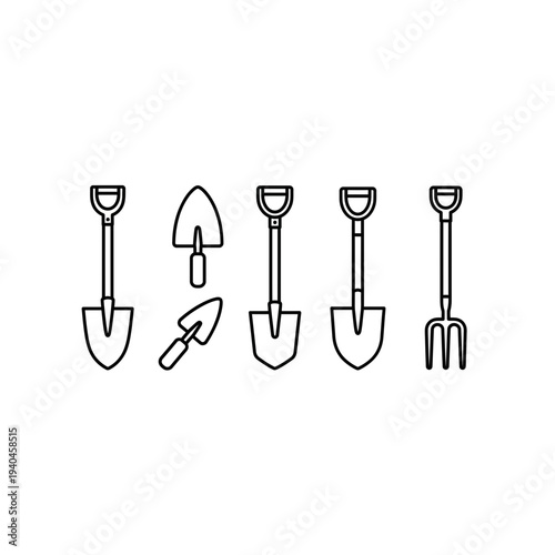 Collection of garden shovels and tools in a line
