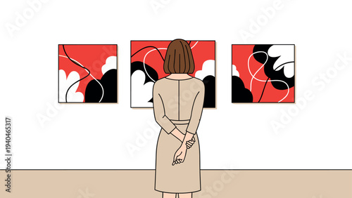 Woman observing abstract art in a gallery setting with bold colors