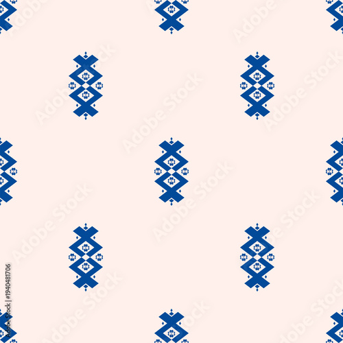 Geometric ethnic seamless pattern in vertical design of blue and soft pink background. Diamond and angular shapes pattern. Vector art, luxury, classic, motifs, folk, tribal style for traditional texti