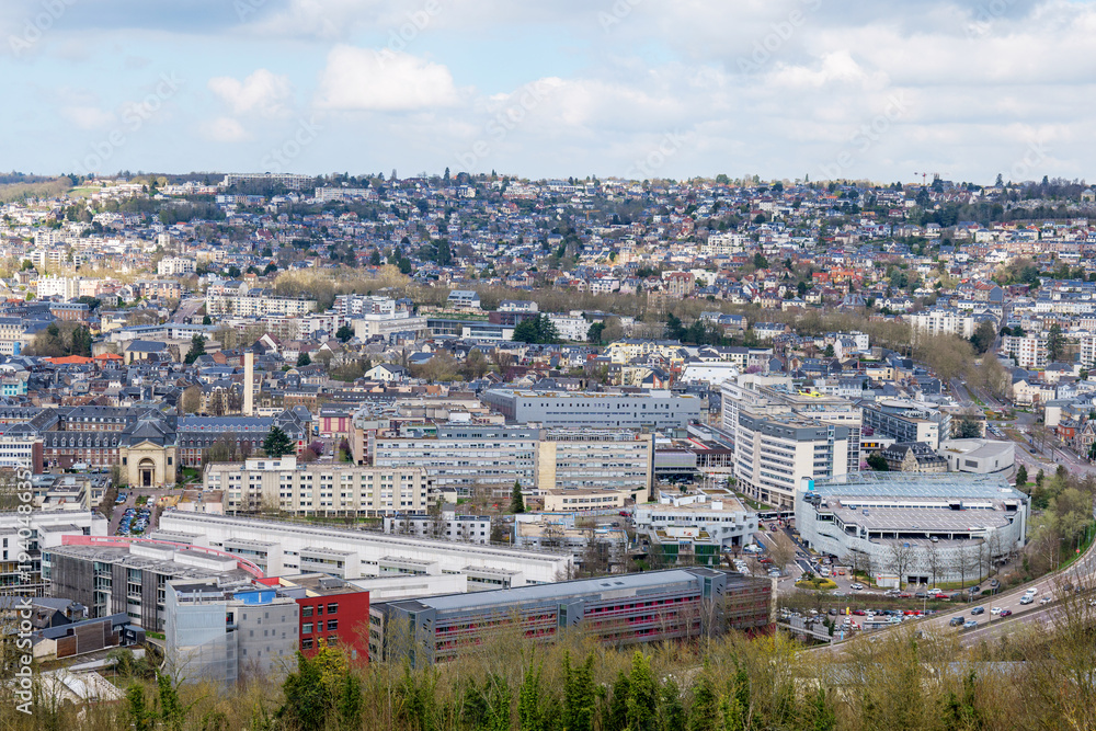 Obraz premium Rouen, France panoramic view of historic city with dense rooftops, towers and classic French architecture. Scenic Normandy destination, European culture, heritage tourism and urban landscape