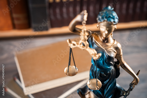 Schilderij op canvas Justice-themed statue with scales, gavel, and books, symbolizing fairness, equality, and the principles of law and moral judgment