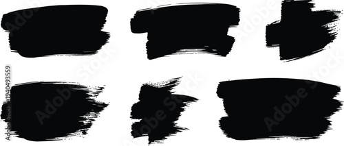 A collection of six black brush strokes on a white background