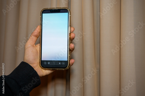 Cuadro en lienzo Close up of hands using smartphone with touchscreen, modern mobile technology and communication concept with blurred screen interface